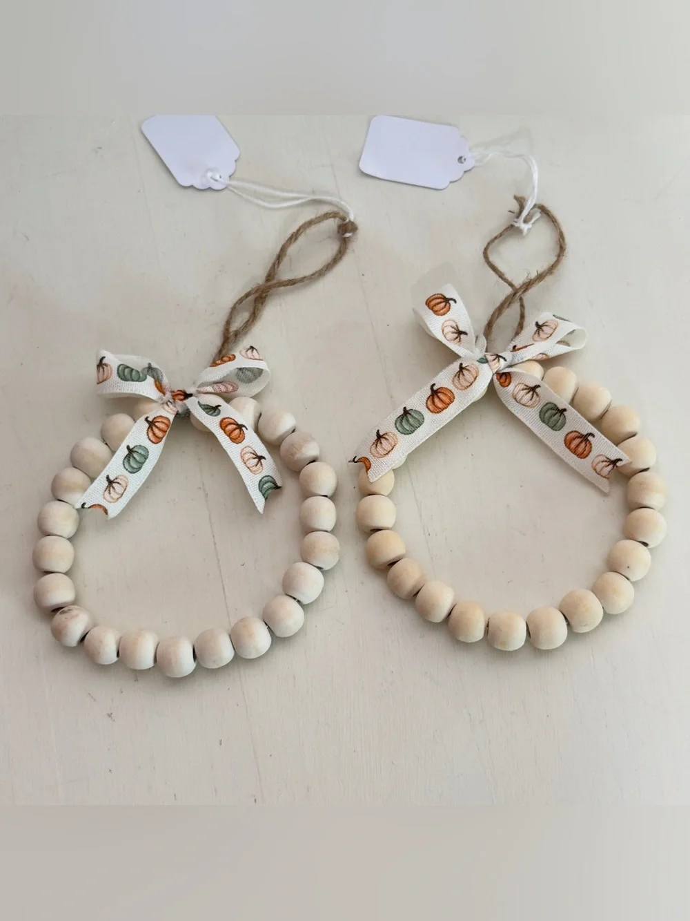 2 Handmade Wood Beaded Ornaments With Pumpkin Print Bow